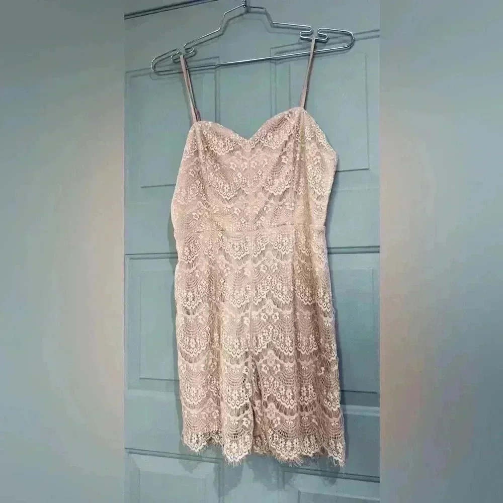 NIKIBIKI NUDE COLOR ROMPER SIZE MED LCB THE LABEL